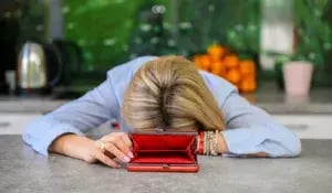 Woman, empty wallet